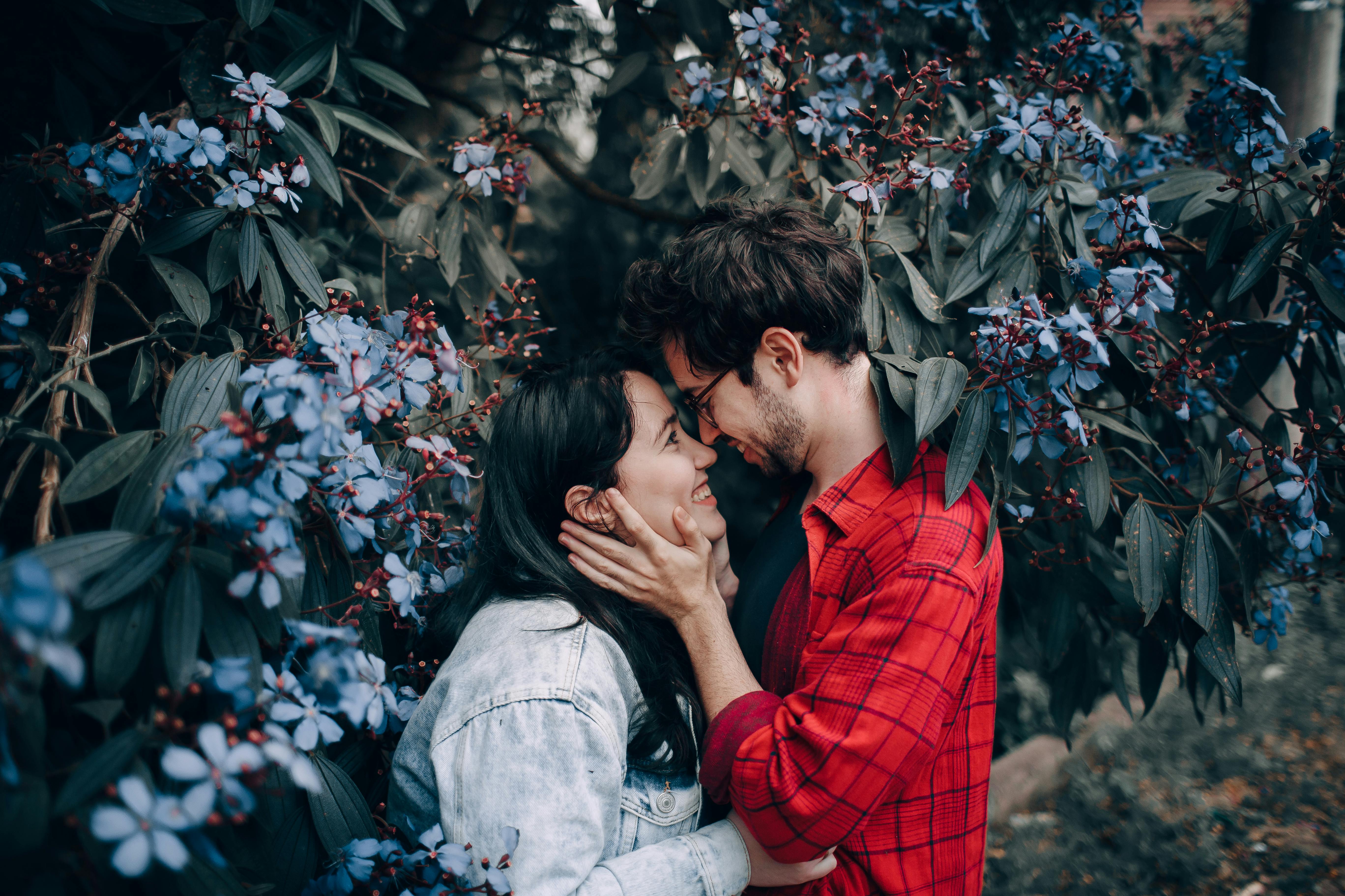 Happy, intimate, mature couple smiling or embracing